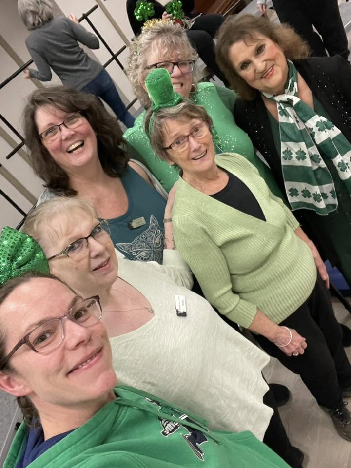 Valley Echoes members celebrating St. Patrick's Day together