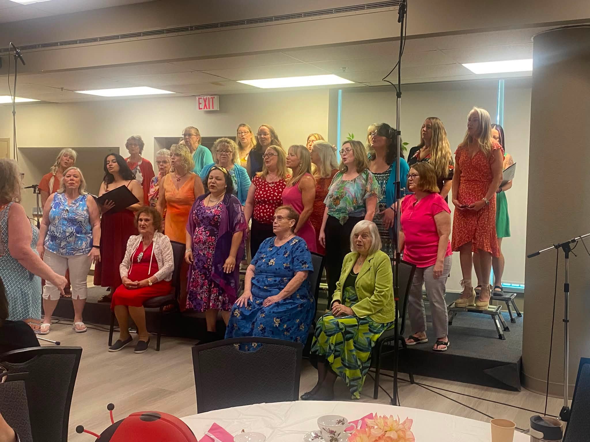 Valley Echoes performing at a community tea